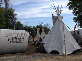 Protesters camp out at the site of an archaeological dig that uncovered First Nations artifacts, on Rue Jacques-Cartier, close to the intersection of the Gatineau and Ottawa rivers.