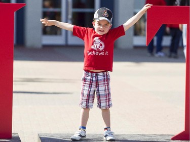 Reid Emery poses at the "I" in United at the Ottawa Senators Fan Fest at Canadian Tire Centre, Saturday, Sept. 27, 2014.