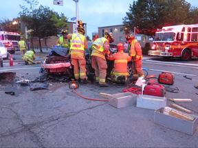 Montreal Road will remain closed following a serious two-vehicle collision Tuesday morning, which sent four people to hospital, including one person in serious condition.