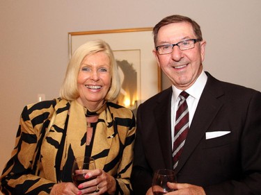 Shirley Westeinde chats with Bob Roberts, retired head of the University of Ottawa Heart Institute, at a reception for Hospice Care Ottawa held Wednesday, Sept. 17, 2014, at the penthouse level of 700 Sussex Drive.