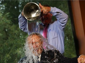 Sir Terry Matthews takes the ALS ice bucket challenge at the Marshes Golf Club in Ottawa, September 02, 2014.