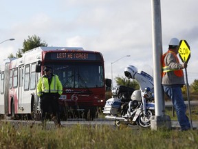 Some OC Transpo buses displayed LEST WE FORGET on the front panels, and drivers all over the city pulled over for one minute at 8:48 a.m. to remember the fatal crash that happened one year ago between a VIA Rail train and an OC Transpo bus at the railroad crossing near Fallowfield station at Woodroofe Avenue a year ago.