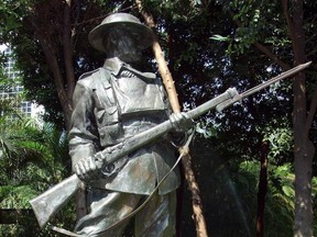 Statue dedicated to the WInnipeg Grenadiers stands in Hong Kong Park.