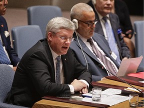 Prime Minister Stephen Harper speaks during a United Nations Security Council meeting on Sept. 24. Canada's parliament could be soon debating whether to do more to help the U.S. combat ISIL.