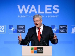 Prime Minister Stephen Harper holds a closing press conference at the NATO Summit in Newport, Wales on Friday, September 5, 2014. THE CANADIAN PRESS/Sean Kilpatrick