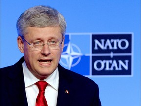 Prime Minister Stephen Harper holds a closing press conference at the NATO Summit in Newport, Wales on Friday, Sept. 5, 2014.