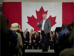 Prime Minister Stephen Harper addresses the Conservative faithful Monday.