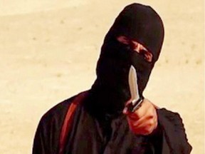 An image grab taken from a video released by the Islamic State (IS) and identified by private terrorism monitor SITE Intelligence Group on September 2, 2014 purportedly shows a masked militant holding a knife and gesturing as he speaks to the camera in a desert landscape before beheading 31-year-old US freelance writer Steven Sotloff. The United States has identified the masked Islamic State militant who murdered Sotloff and US journalist James Foley in separate videotaped beheadings, FBI chief James Comey said on September 25, 2014. "We believe we have identified the executioner," Comey told reporters at a briefing in Washington. "I won't tell you who it is."