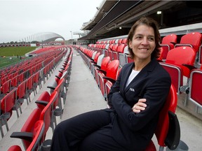 Tatjana Haenni, FIFA Head of Women's Competitions, tries out a seat as representatives of of the FIFA Women's World Cup 2015 toured TD Place to get an assessment of the stadium.
