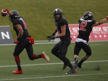The Carleton Ravens' Nathaniel Behar runs into the end zone for the dramatic game-winning touchdown against the University of Ottawa Gee-Gees in the Panda Game on Saturday, Sept. 20, 2014.