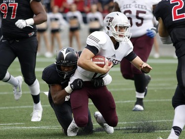 The University of Ottawa Gee-Gees and the Carleton Ravens in Panda Game action at TD Place on Sept. 20, 2014.