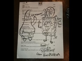 Jeffrey Ferguson, a server and entertainment director at Wakefield's Le Hibou resto-bar, is pleased as punch over this drawing by SpongeBob SquarePants artist Vincent Waller of SpongeBob with his pals Gary the snail on SpongeBob's head and and Patrick the Starfish.