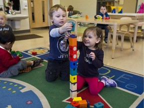 Jack and Sutton play with blocks at the Andrew Fleck Child Care Centre at the Stittsville Public School. A coalition of a dozen child-care organizations says city council has taken a “very narrow” view of its role as the overseer of early learning and child care, focusing mainly on how it manages costs and fee subsidies.