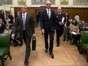 Minister of Public Safety Steven Blaney (centre), CSIS Director Michel Coulombe (left) and RCMP Commissioner Bob Paulson appear at the Commons National Security committee Wednesday in Ottawa.
