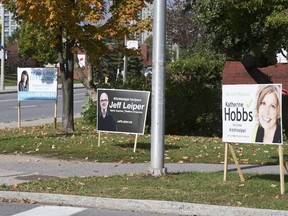 Campaign signs in Westboro showing Hobbs, Leiper and Reimer. (Pat McGrath / Ottawa Citizen)