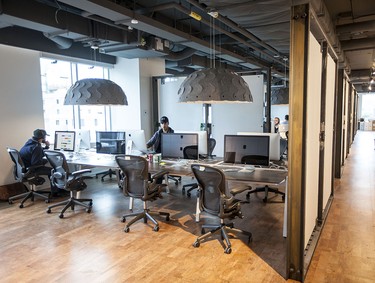 Glass and natural materials, including cork flooring, are heavily used in the new Shopify offices at 150 Elgin St. in Ottawa Friday, October 17, 2014. (Darren Brown/Ottawa Citizen)