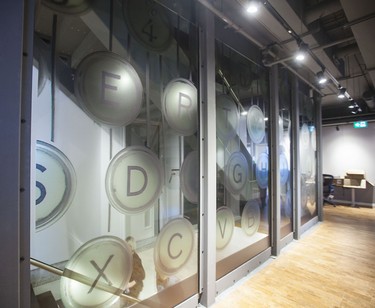 Glass and natural materials, including cork flooring, are heavily used in the new Shopify offices at 150 Elgin St. in Ottawa Friday, October 17, 2014. (Darren Brown/Ottawa Citizen)