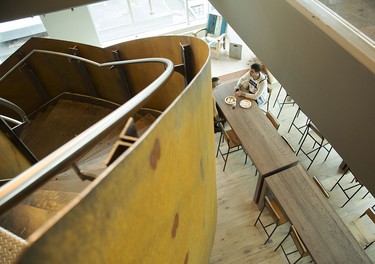 Glass and natural materials, including this steel staircase, are heavily used in the new Shopify offices at 150 Elgin St. in Ottawa Friday, October 17, 2014. (Darren Brown/Ottawa Citizen)