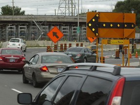 Construction signs along an Ottawa roadway. One letter writer is not happy about the state of our roads.