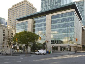 The Prime Minister’s Office announced the naming of the James Michael Flaherty Building at 90 Elgin Street following a private ceremony with Harper, Flaherty’s widow Christine Elliott and her sons John, Galen and Quinn.