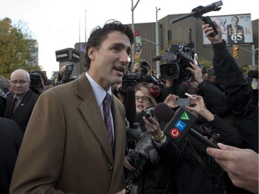 Liberal party leader Justin Trudeau spoke to media prior to a memorial where MP's of all parties came to pay their respects Oct 23 at the Cenotaph where a soldier was shot dead Oct 22. The gunman was later killed when he stalked the halls of Parliament Hill.