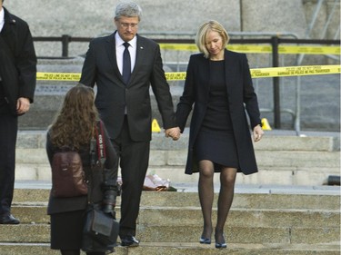 Prime Minister Stephen Harper and Laureen Harper paid their respects and laid flowers Oct 23 at the Cenotaph where a soldier was gunned down.
