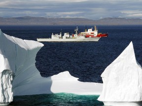20 August 2008 Hudson Strait, Arctic Ocean   HMCS Toronto and the Canadian Coast Guard Ship (CCGS) Pierre Radisson sail past an iceberg in the Hudson Strait off the coast of Baffin Island. Both ships are part of Operation NANOOK.   Operation NANOOK is a Canada Command sovereignty operation, taking place in Canadaís arctic waters.  Ranging from Iqaluit on Baffin Island to the Hudson Straits area, the operation will include joint co-operation from Army, Navy, and Air Force units, training Canadian Forces personnel to support other government departments.  In close cooperation with the Coast Guard and RCMP, operations such as NANOOK increase inter-department effectiveness, in addition to bolstering Canadaís presence in her northern territories.   Photo by: Sergeant Kevin MacAulay  Can be used with Andrew Mayeda (Canwest) story