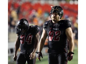 Zack Evans, right, of the Ottawa Redblacks, played every defensive snap for the Redblacks last Friday night.