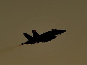 A Canadian CF-18 jet takes off on a mission during the 2011 war against Libya.  AFP Photo