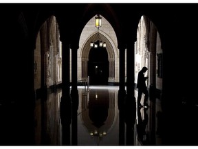 A person walks through the halls of the Centre block on Parliament Hill in Ottawa in a 2010 photo. THE CANADIAN PRESS/Sean Kilpatrick