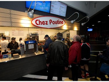 A poutine stand is popular as the Ottawa 67's held their home opener in the renovated TD Place arena.