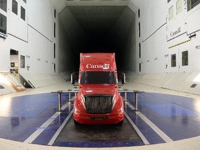 A truck (a third of regular size) awaits testing inside a nine-metre wind tunnel at the National Research Council.