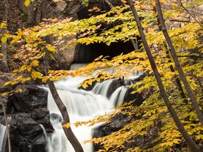 A waterfall is photographed in Chelsea, QC Saturday October 11, 2014. (Darren Brown/Ottawa Citizen)