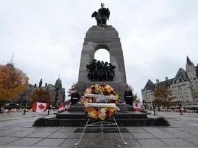 A wreath placed by U.S. Secretary of State John Kerry rests at the National War Memorial in Ottawa on Tuesday, October 28, 2014.