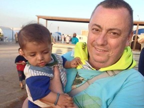 This undated family handout photo shows British man Alan Henning, who was held hostage by the Islamic State group. An Internet video released Friday purports to show an Islamic State group fighter beheading British hostage Alan Henning and threatening yet another American captive, the fourth such killing carried out by the extremist group now targeted in U.S.-led airstrikes. The video mirrored other beheading videos shot by the Islamic State group, which now holds territory along the border of Syria and Iraq. It ended with an Islamic State fighter threatening a man they identified as an American.