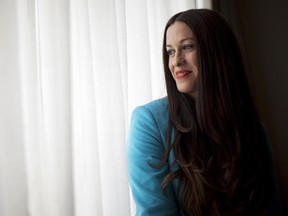 Canadian singer Alanis Morissette poses for a photo in Toronto on Thursday, August 2, 2012. Morissette is releasing her seventh album 'Havoc And Bright Lights' on August 28th.