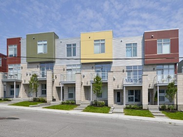 Architect Barry Hobin used multi-coloured Hardie board to help define a low-rise housing development called Urbano Towns in Little Italy that netted an award for builder Legacy Homes.