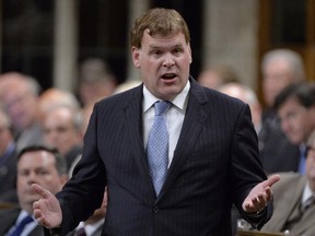 Foreign Affairs Minister John Baird responds to a question during Question Period in the House of Commons, Monday, September 29, 2014 in Ottawa.