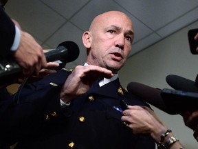 RCMP Commissioner Bob Paulson responds to questions after addressing a Senate committee Monday.