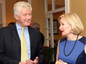 British High Commissioner Howard Drake in conversation with Laureen Harper, wife of Prime Minister Stephen Harper, at a reception held at the diplomat's official residence, Earnscliffe, on Wednesday, Oct. 8, 2014, in honour of the National Arts Centre Orchestra's upcoming tour to the UK.