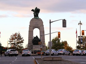 The National War Memorial is surrounded by police officers in Ottawa, Canada on Wednesday October 22, 2014 after a gunman opened fire killing a soldier.