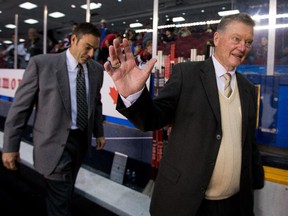 Brian Kilrea leads Ottawa 67's coach Jeff Brown onto the bench on Friday, Oct. 17, 2014. In recognition of his upcoming 80th birthday, Kilrea was signed to a one-day contract to help coach the 67's.