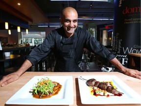 Chef Mook Sutton of Teatro restaurant in the lobby of the GCTC with two of his dishes, Bison Skewers and Duck Breast.