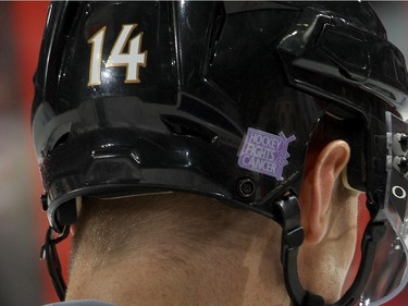 Colin Greening #14 of the Ottawa Senators wears his helmet with a Hockey Fights Cancer decal during the pre-game skate.