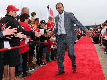 Chris Phillips is greeted on the red carpet.