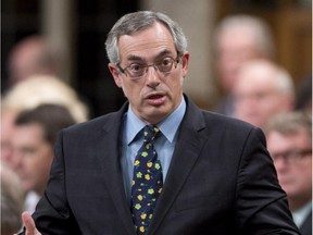 Treasury Board President Tony Clement responds to a question during Question Period in the House of Commons Thursday September 25, 2014 in Ottawa.