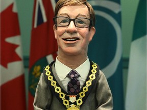 CLOSEUP of Ottawa Mayor Jim Watson puppet, made by Noreen Young and presented to  Ottawa mayor Jim Watson  Wednesday, July 23, 2014, at City Hall.