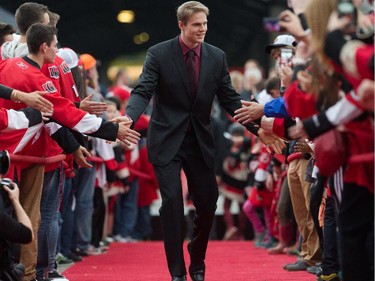 Colin Greening is greeted on the red carpet.
