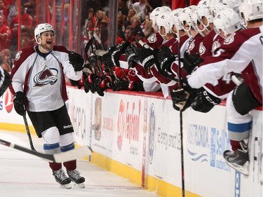 John Mitchell #7 of the Colorado Avalanche celebrates his first period shorthanded goal.