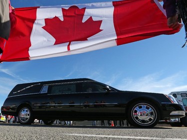 The body of Cpl. Nathan Cirillo is transported by hearse from Ottawa to Hamilton via the Highway of Heroes, October 24, 2014.